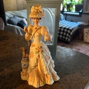 Avon Victorian Lady Figurine in Cream and Orange
